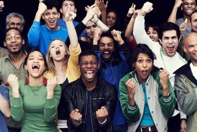 photo of group of people cheering